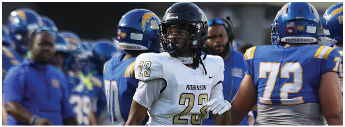 A football player wearing a blue and white uniform. Description generated by AI
