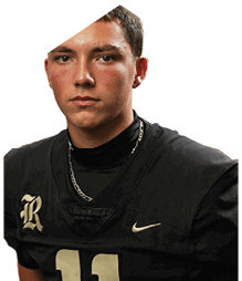A young man wearing a white jersey with the number 10 on it. Description generated by AI