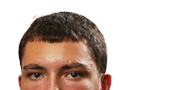 A young man wearing a white jersey with the number 10 on it. Description generated by AI