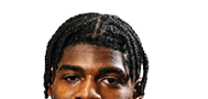 A young man wearing a white jersey with the number 10 on it. Description generated by AI