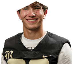 A young man wearing a white jersey with the number 10 on it. Description generated by AI