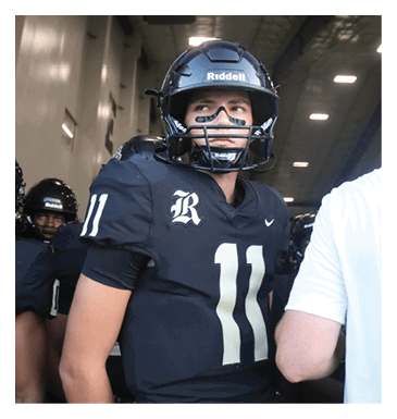 Two men wearing football helmets are talking to each other. AI generated content