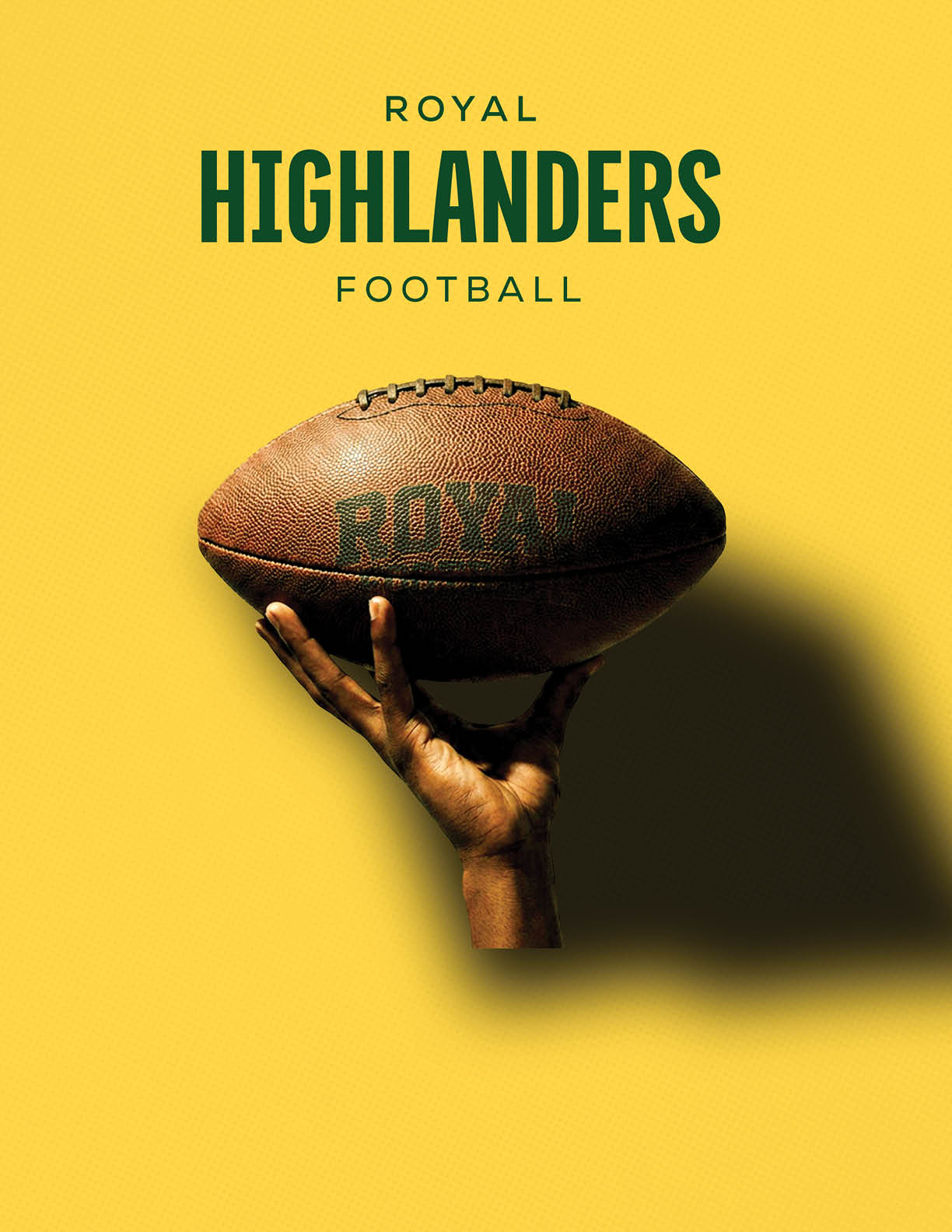 A football is being held by a person. Description generated by AI