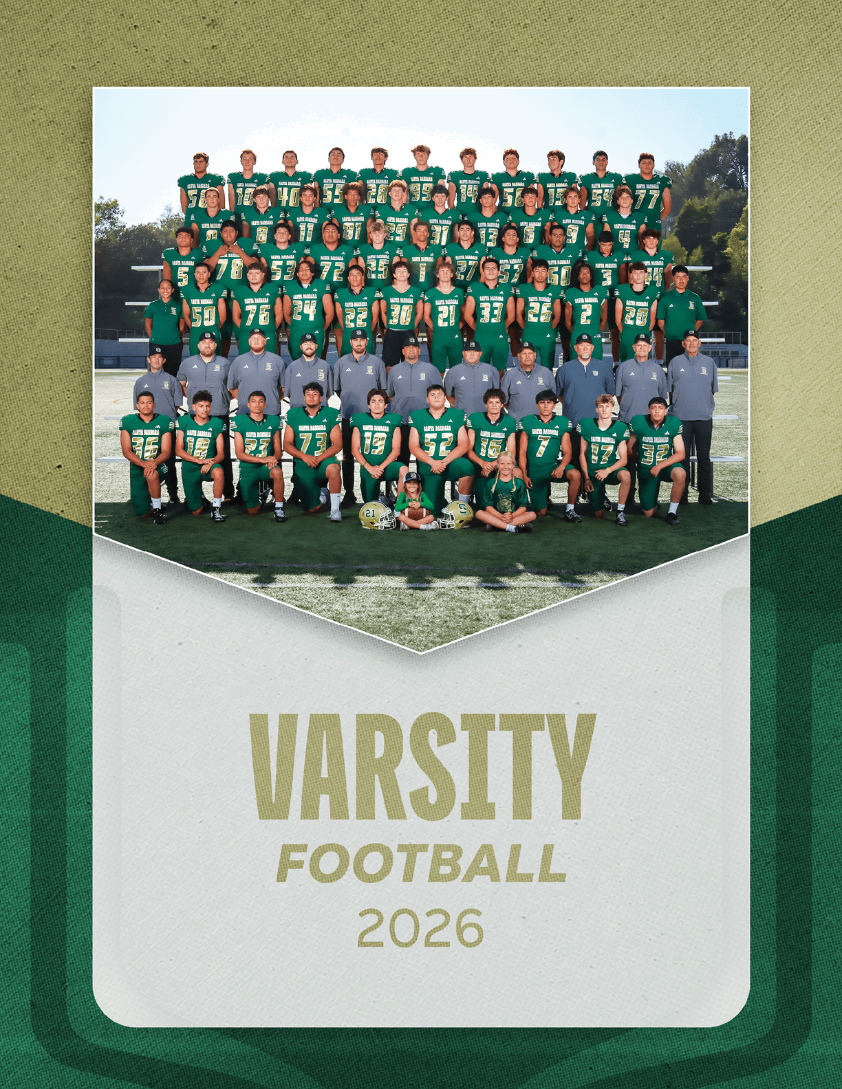 A large group of people wearing green football uniforms and gray shirts pose together on a football field with the text varsity football 2026 below them. Description generated by AI