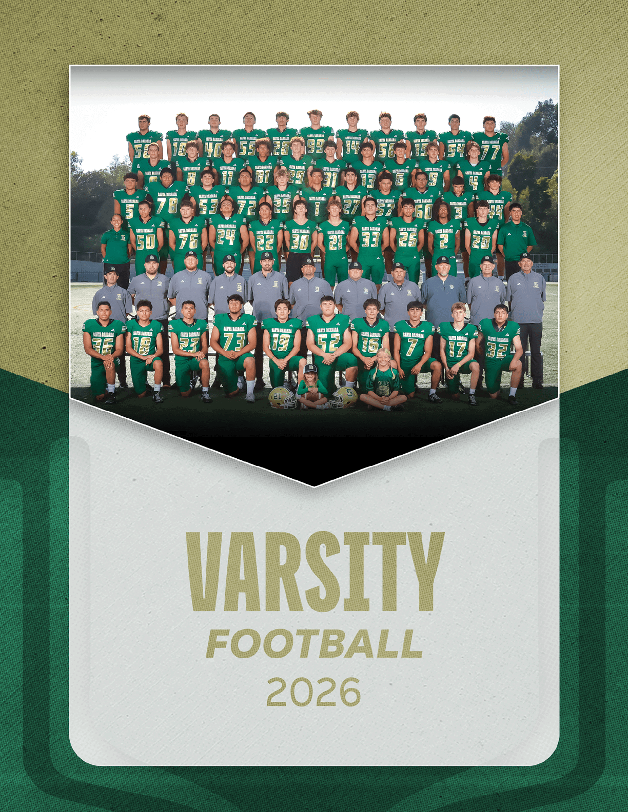 A large group of people wearing green football uniforms and gray shirts pose together outdoors on a field above the text varsity football 2026. Description generated by AI