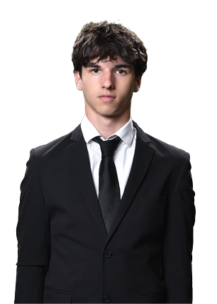 A young man wearing a white and black jersey with the number 14 on it. Description generated by AI