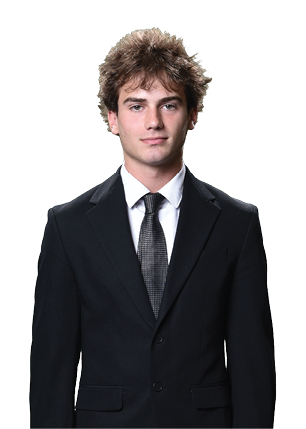 A young man wearing a white and black jersey with the number 14 on it. Description generated by AI