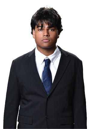 A young man wearing a white and black jersey with the number 14 on it. Description generated by AI