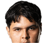 Person with curly hair and light eyes looking forward against a white background. Description generated by AI