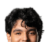 Person with curly hair and light eyes looking forward against a white background. Description generated by AI