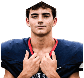 A young man wearing a white jersey with the number 10 on it. Description generated by AI