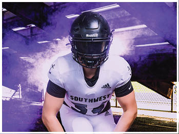 A football player running on the field. Description generated by AI