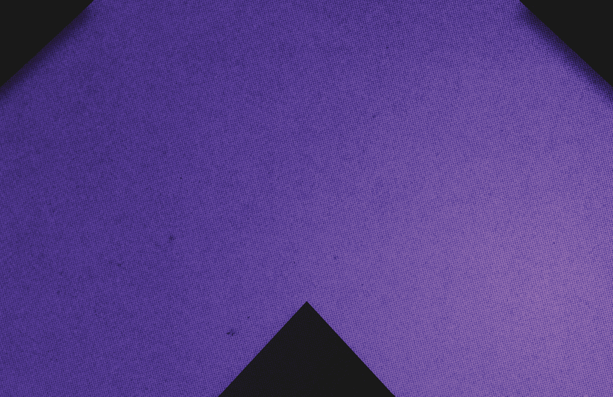 A red and black triangle. Description generated by AI