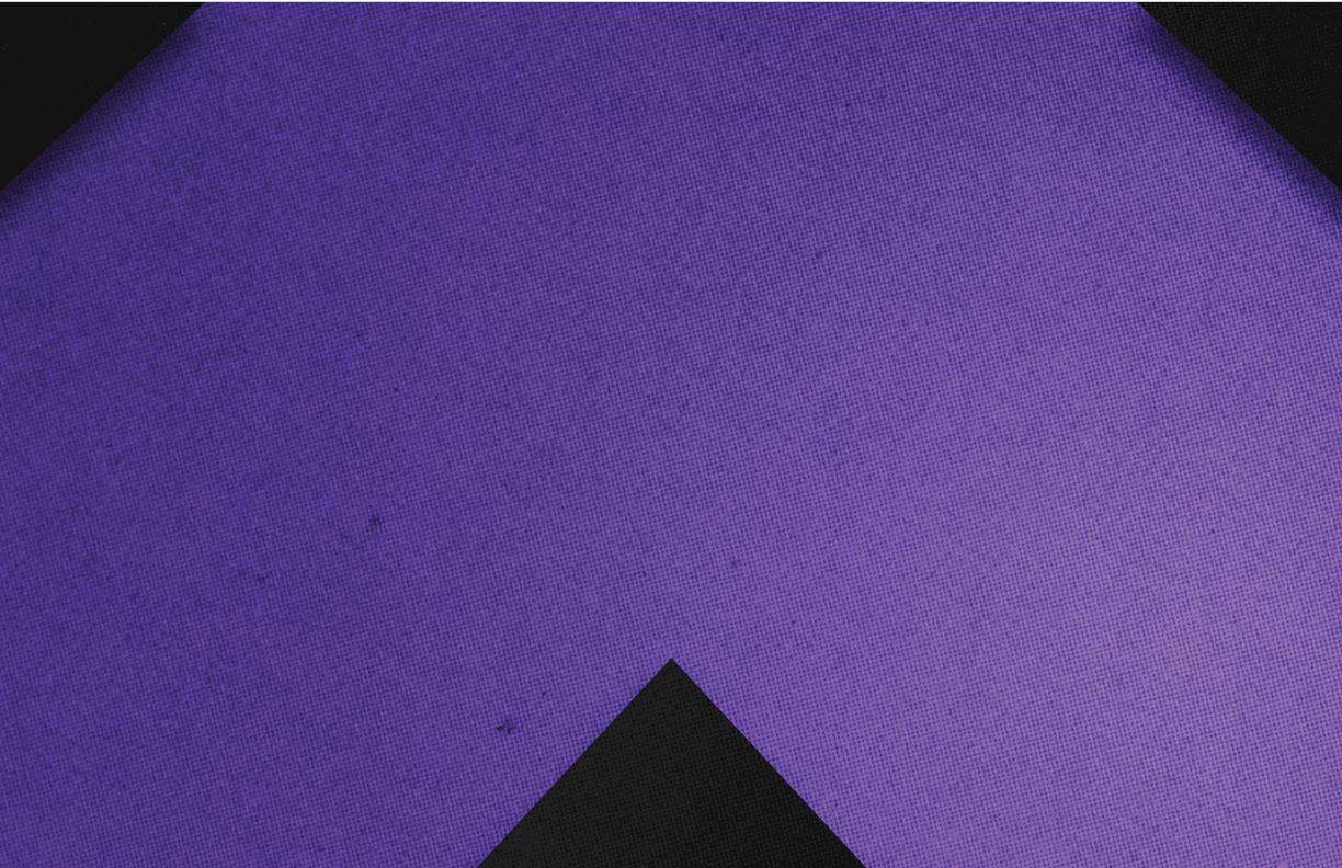 A red and black triangle. Description generated by AI