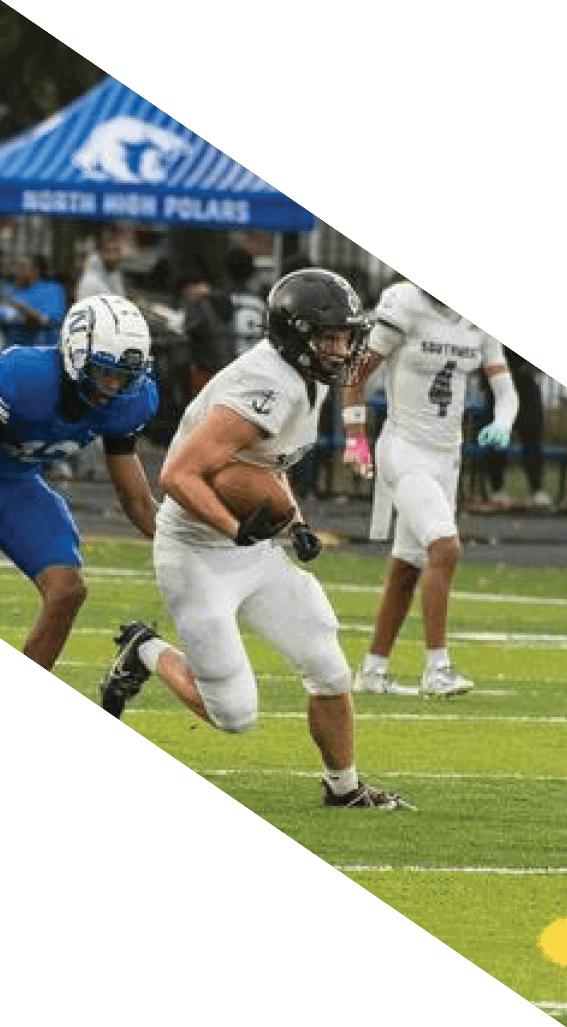 A football player wearing a black helmet and white jersey is holding a football in his hands. AI generated content