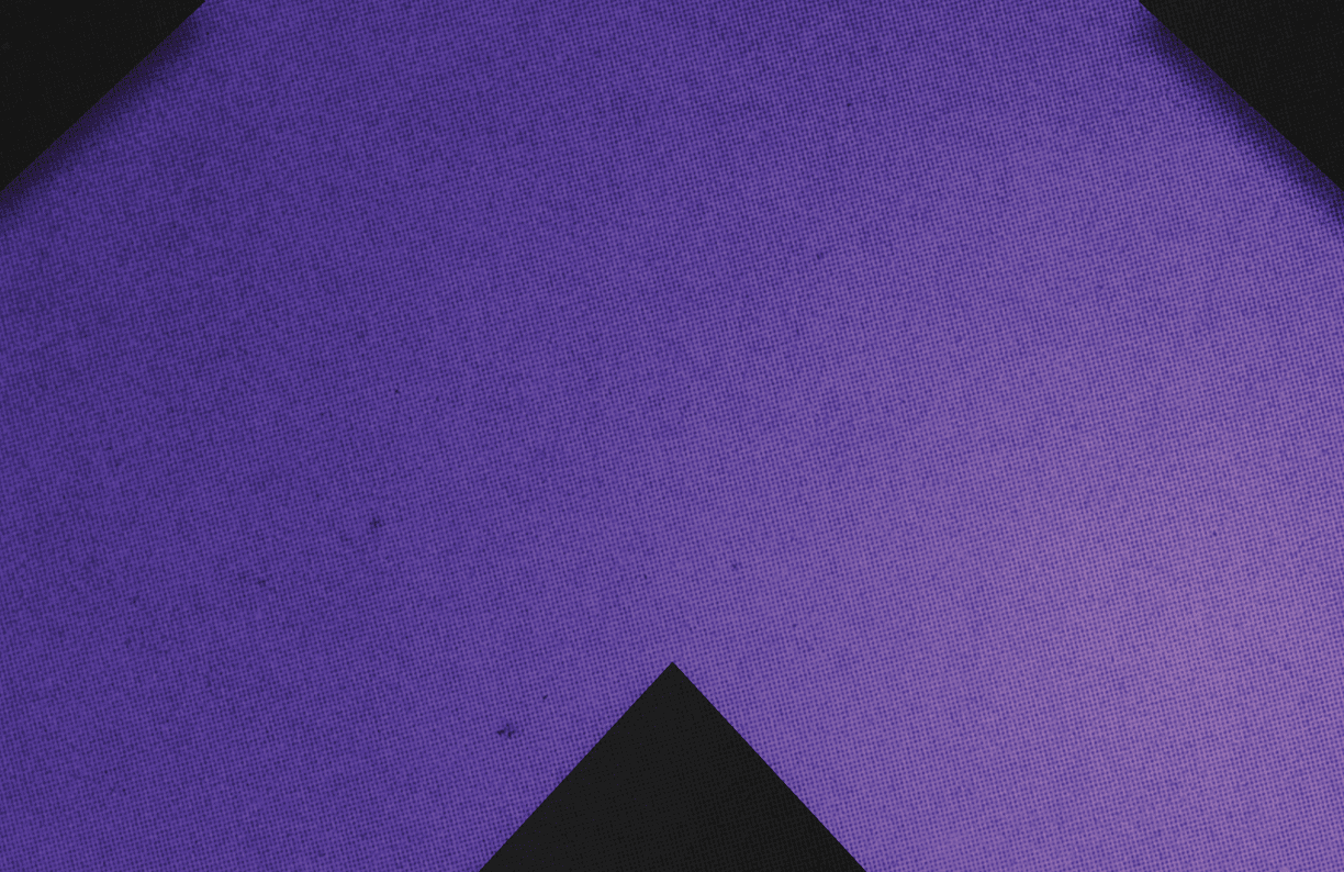 A red and black triangle. Description generated by AI