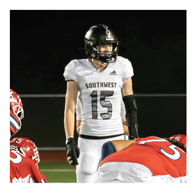 A football player in a white jersey with the number 85 on it is trying to catch a football. AI generated content