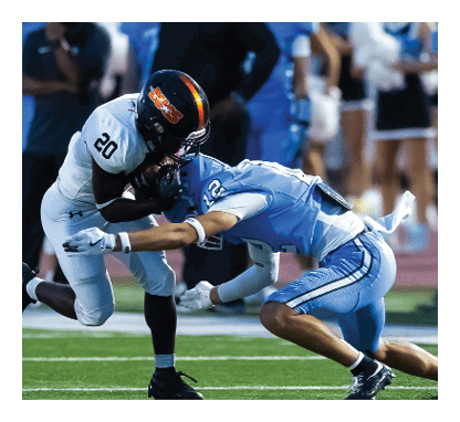 Two football players are tackling each other on the field. AI generated content