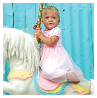 A young girl is riding a white horse, holding onto a pole. AI generated content