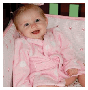 A baby wearing a pink robe is sitting in a crib. AI generated content