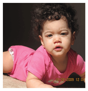 A young child is lying on the floor wearing a pink dress. AI generated content