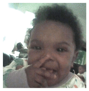 A baby is making a funny face with its fingers. AI generated content