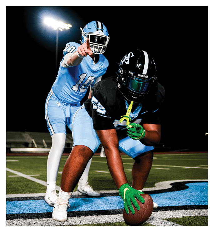 Two football players on a field, one pointing at the other. AI generated content
