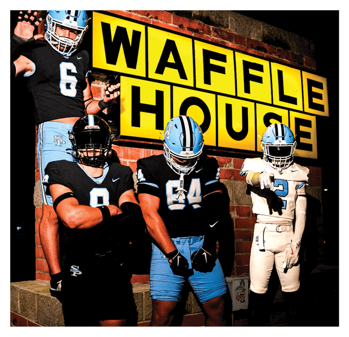 Four football players pose in front of a Waffle House sign. AI generated content
