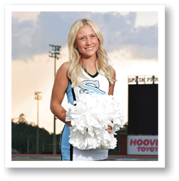 A cheerleader in a blue and white uniform holding a pom pom. AI generated content