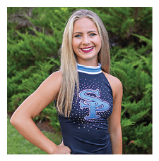 A young girl wearing a cheerleading outfit and holding her hand on her hip. AI generated content