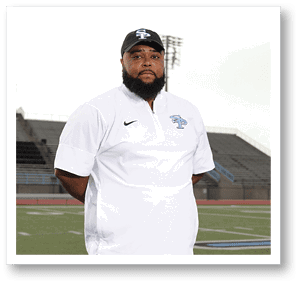 A man wearing a white shirt and a black hat stands on a football field. AI generated content
