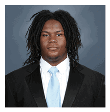 A man wearing a suit and tie with long hair. AI generated content