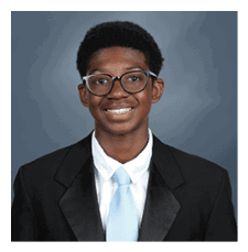 A young man wearing a suit and tie is smiling for the camera. AI generated content