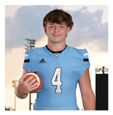 A football player wearing a blue jersey with the number 4 on it. AI generated content