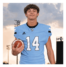 A football player in a blue jersey with the number 14 on it. AI generated content