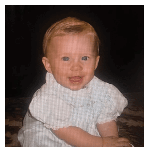 A young child is sitting on a rug, wearing a white shirt and white socks. The child is smiling and appears to be enjoying the moment. AI generated content