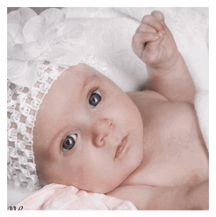A baby wearing a white hat and laying on a pink blanket. AI generated content