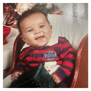A baby is sitting in a chair and smiling. AI generated content