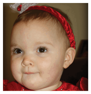 A young child wearing a red dress with a bow on her head. AI generated content