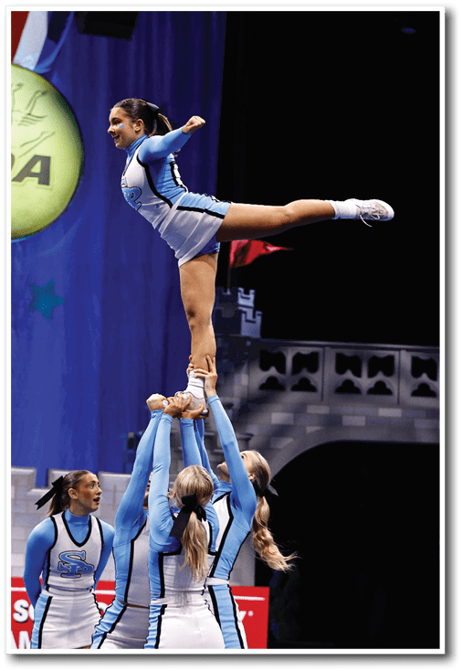 A gymnast performs a trick on a high beam, surrounded by her teammates. AI generated content