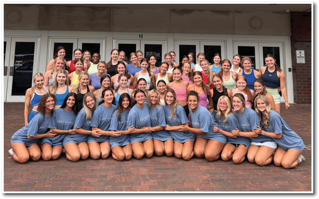 A group of women pose for a picture in front of a building. AI generated content