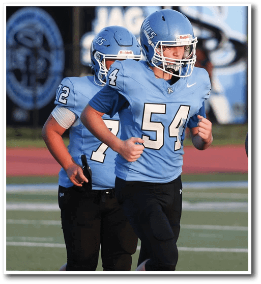 Three football players running on a field. AI generated content