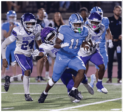 A group of football players are running on the field. AI generated content