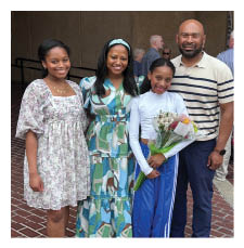 A family poses for a picture in front of a building. AI generated content