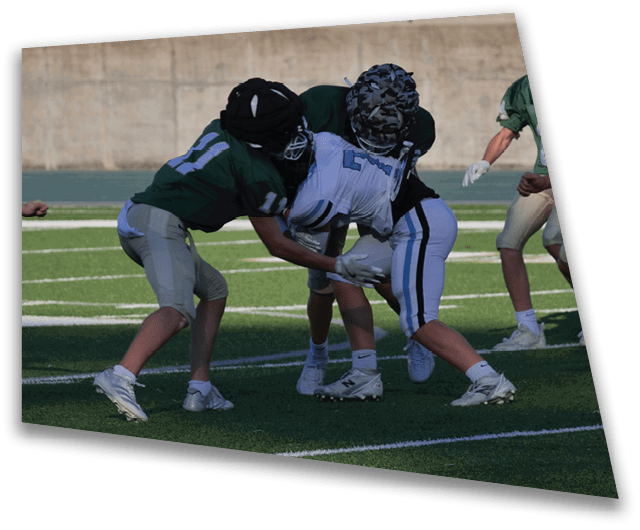 A group of young men playing football on a field. AI generated content