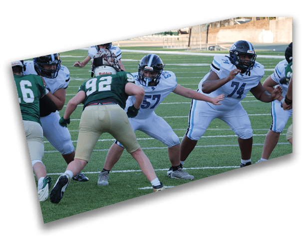 A group of football players on a field, one of them wearing a helmet. AI generated content