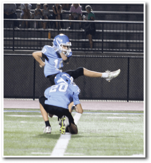 Three football players running on a field. AI generated content