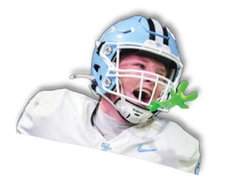 A person wearing a light blue football helmet and white jersey is shouting or yelling with a green mouthguard hanging from the helmet. Description generated by AI
