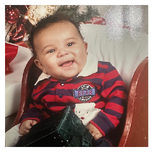A baby is sitting in a chair and smiling. AI generated content