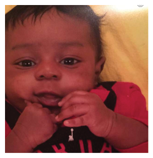 A young child wearing a basketball jersey with the number 23 on it. AI generated content